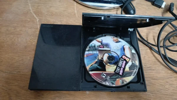 CL/ Pinguim /PS2 SLIM LEITOR 100% 109,00 SEGUIDOS 9,00 - Imagem 3