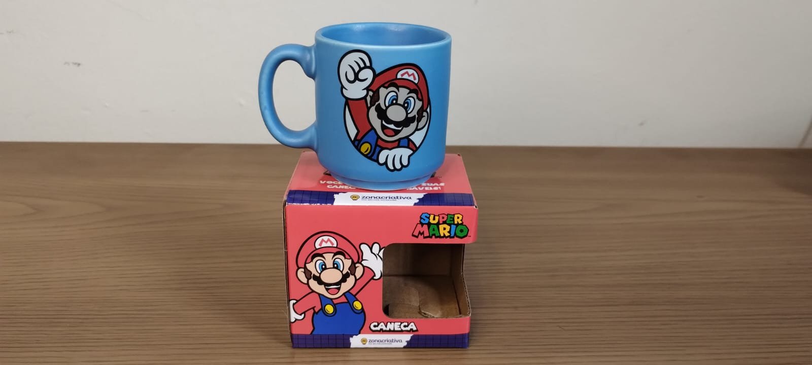 FH/ Caneca Super Mario 39,00 Seguidos de 5,00