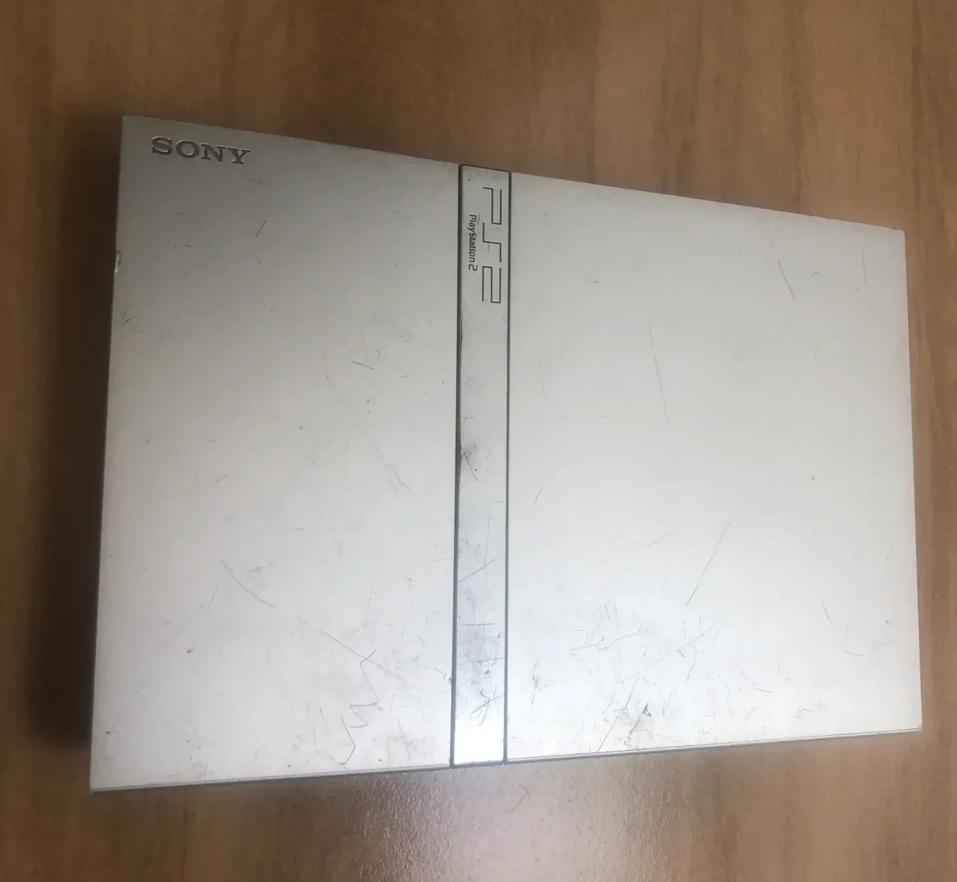 B9/ PLAYSTATION 2 SILVER 💣 89,00 SEGUIDOS DE 23,00