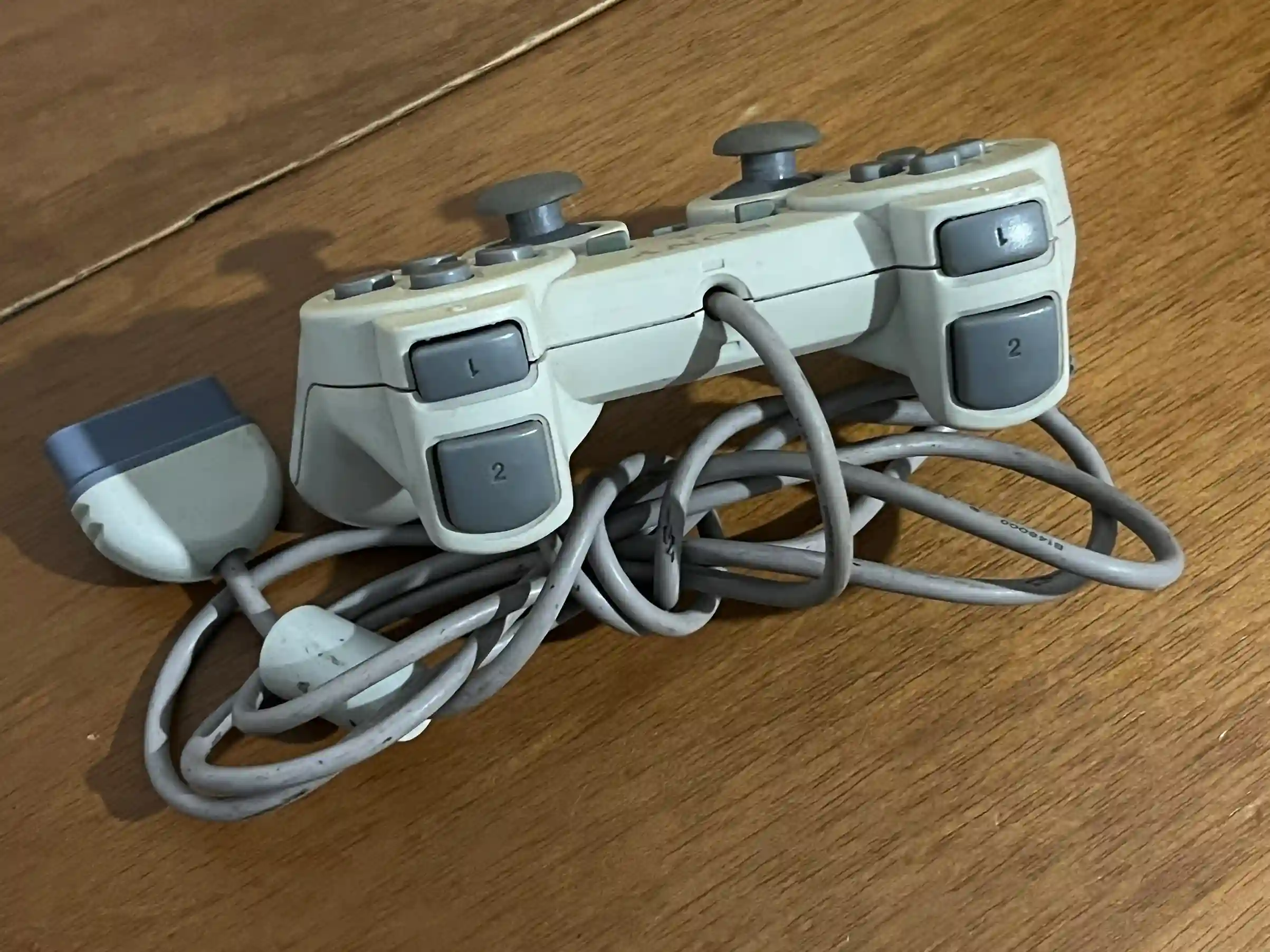 CX/ Junior88 /ORIGINAL PARA CONTROLE PS1. 57,00 SEGUIDOS DE 12,00