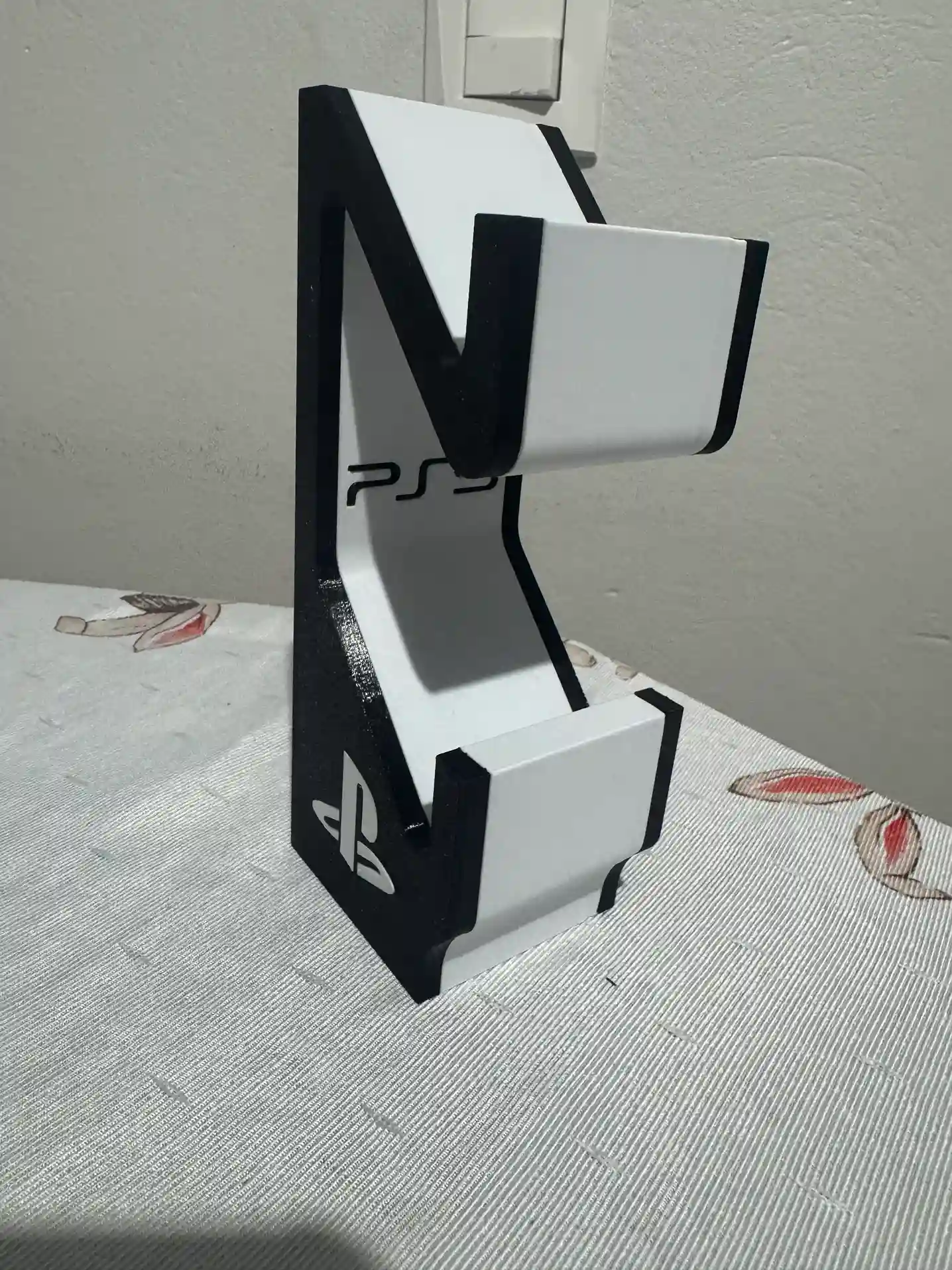 RL/ SUPORTE CONTROLE PS5 37,00 SEGUIDOS DE 5,00