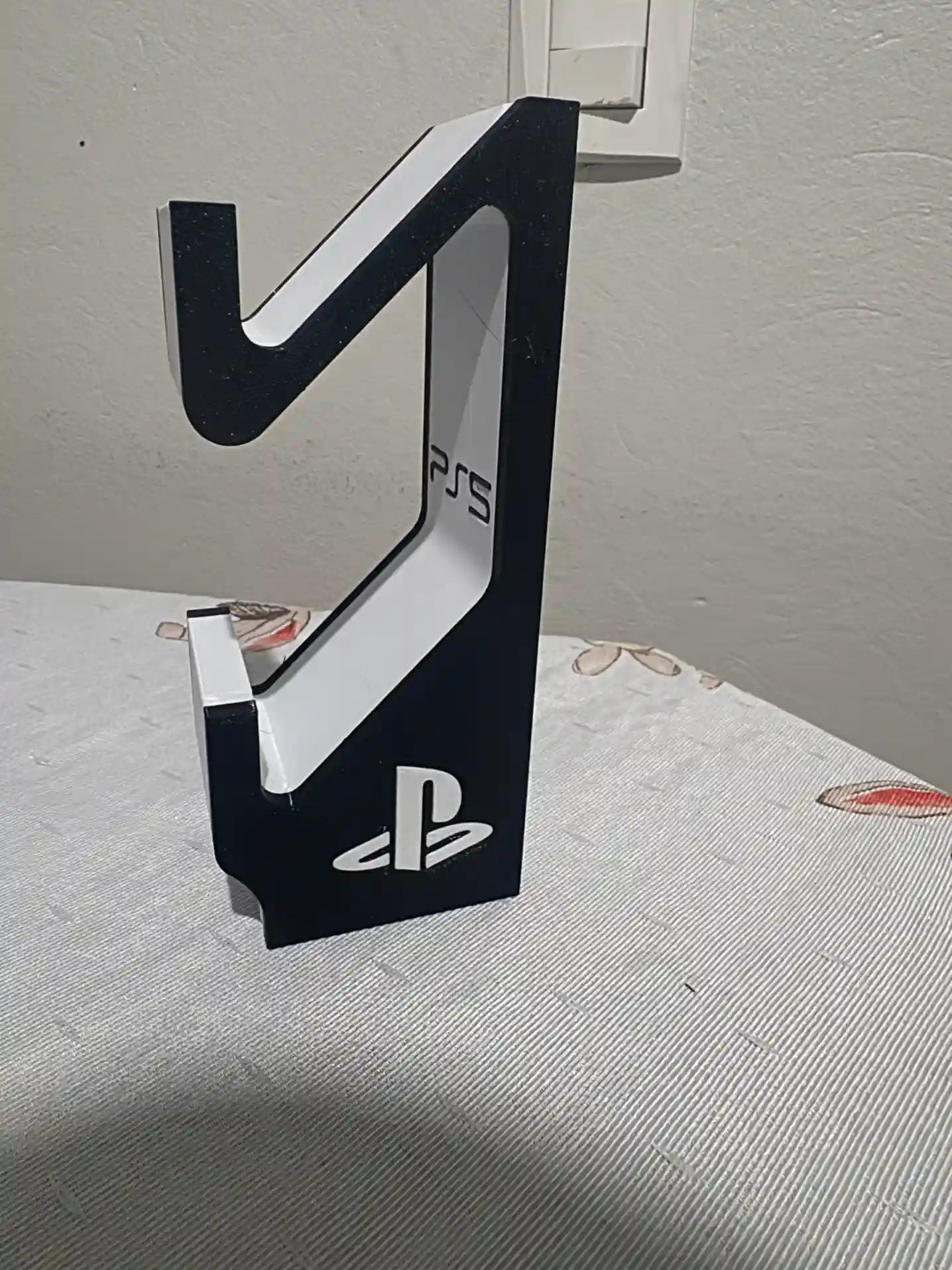 RL/ SUPORTE CONTROLE PS5 37,00 SEGUIDOS DE 5,00