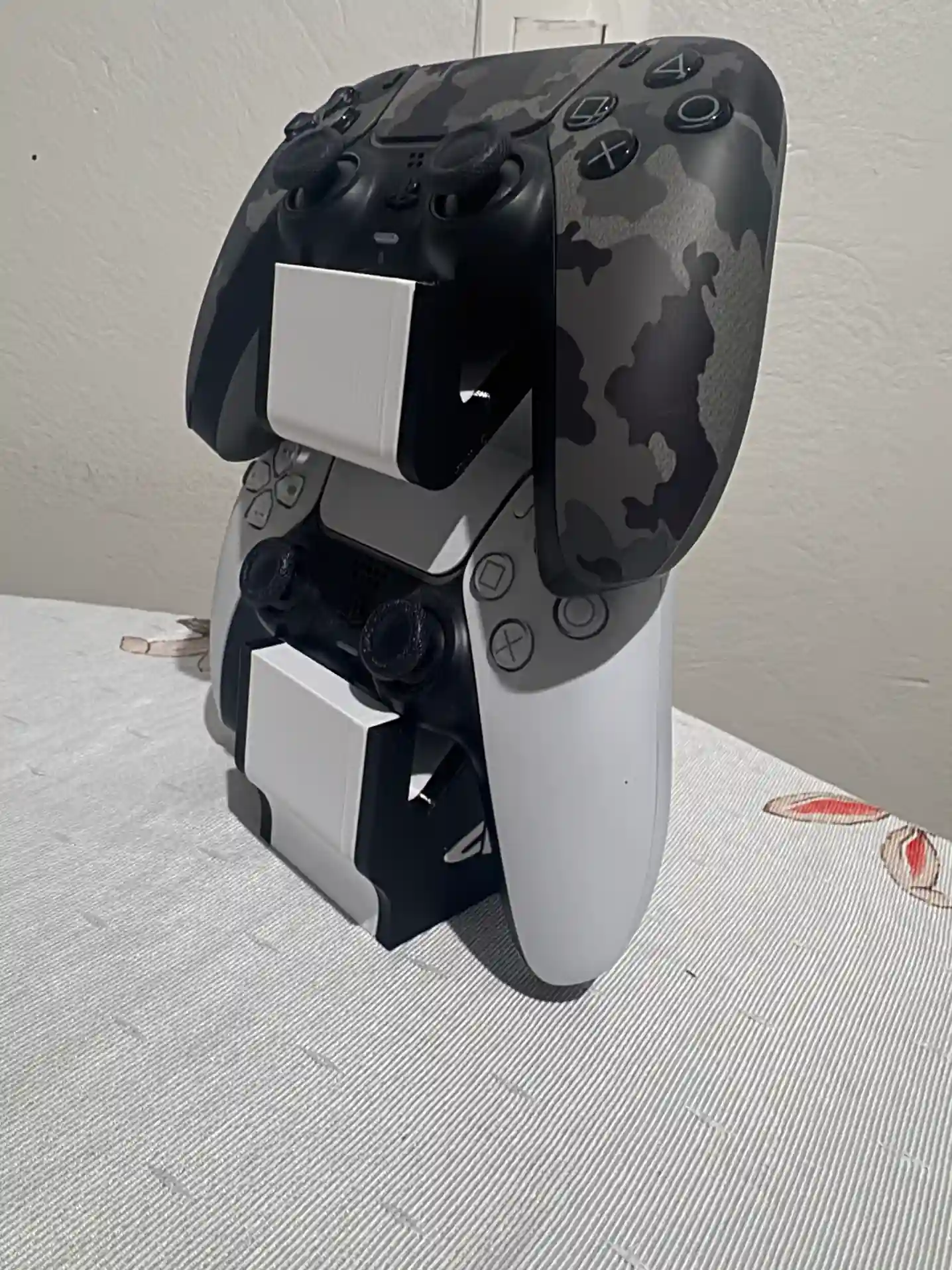 RL/ SUPORTE CONTROLE PS5 37,00 SEGUIDOS DE 5,00