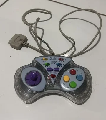 NR/ CONTROLE AQUA PAD SUPER NINTENDO 77,00 SEGUIDOS DE 12,00