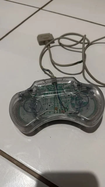 NR/ CONTROLE AQUA PAD SUPER NINTENDO 77,00 SEGUIDOS DE 12,00