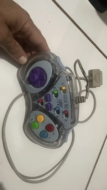 NR/ CONTROLE AQUA PAD SUPER NINTENDO 77,00 SEGUIDOS DE 12,00