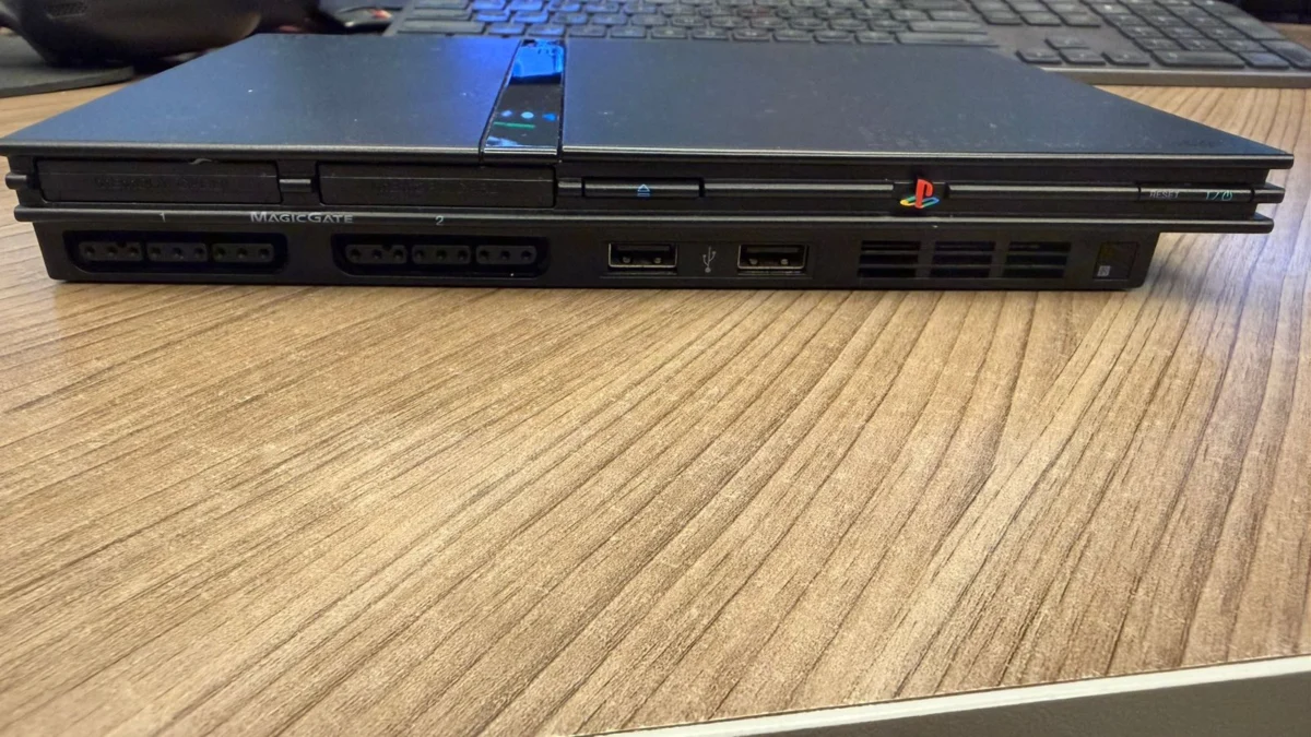 R9/ PLAYSTATION 2 SLIM! 99,00 SEGUIDOS DE 25,00