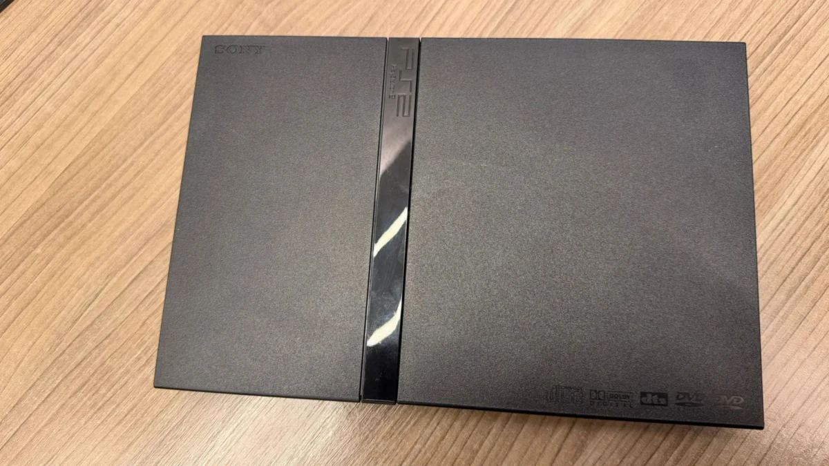 R9/ PLAYSTATION 2 SLIM! 99,00 SEGUIDOS DE 25,00