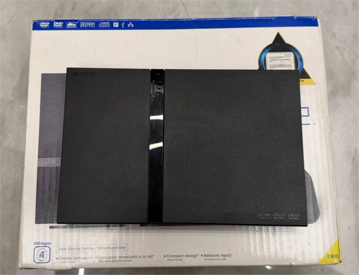 R9/ PLAYSTATION 2 SLIM! 99,00 SEGUIDOS DE 25,00