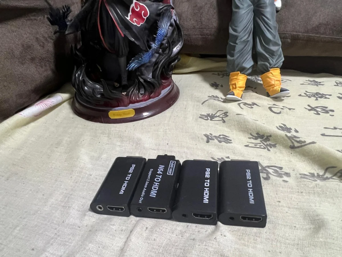 CB/ S*R /LOTE ADAPTADORES HDMI, PS2 E N64 66,00 SEGUIDOS DE 5,00