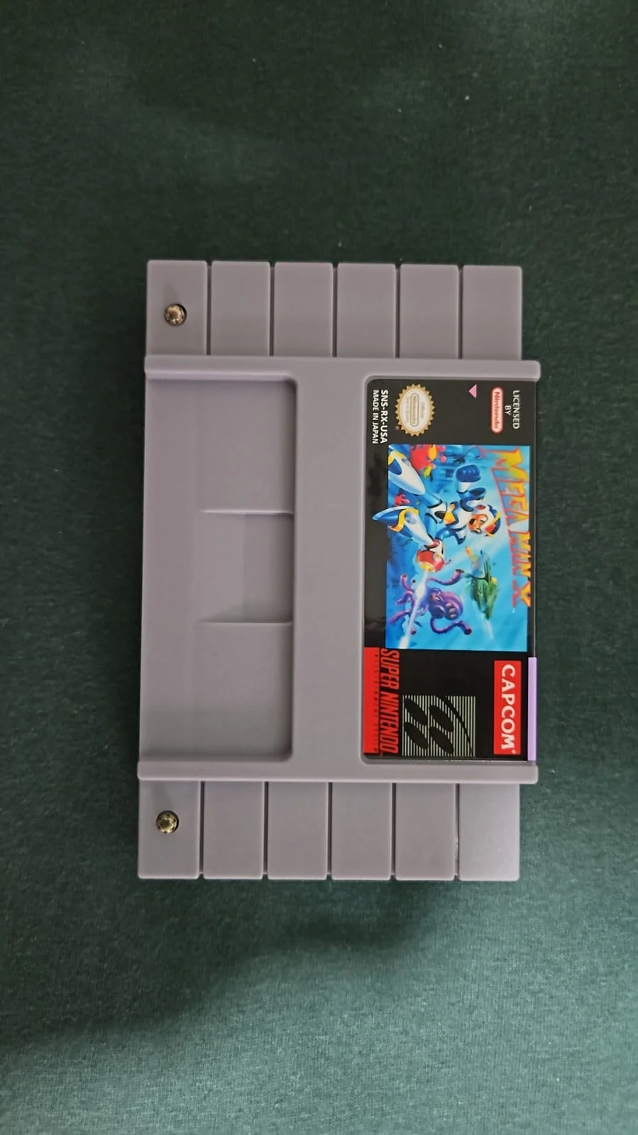 CX/ L*o B**to /MEGAMAN X! EM PORTUGUÊS BR! SNES. 57,00 SEGUIDOS DE 9,00