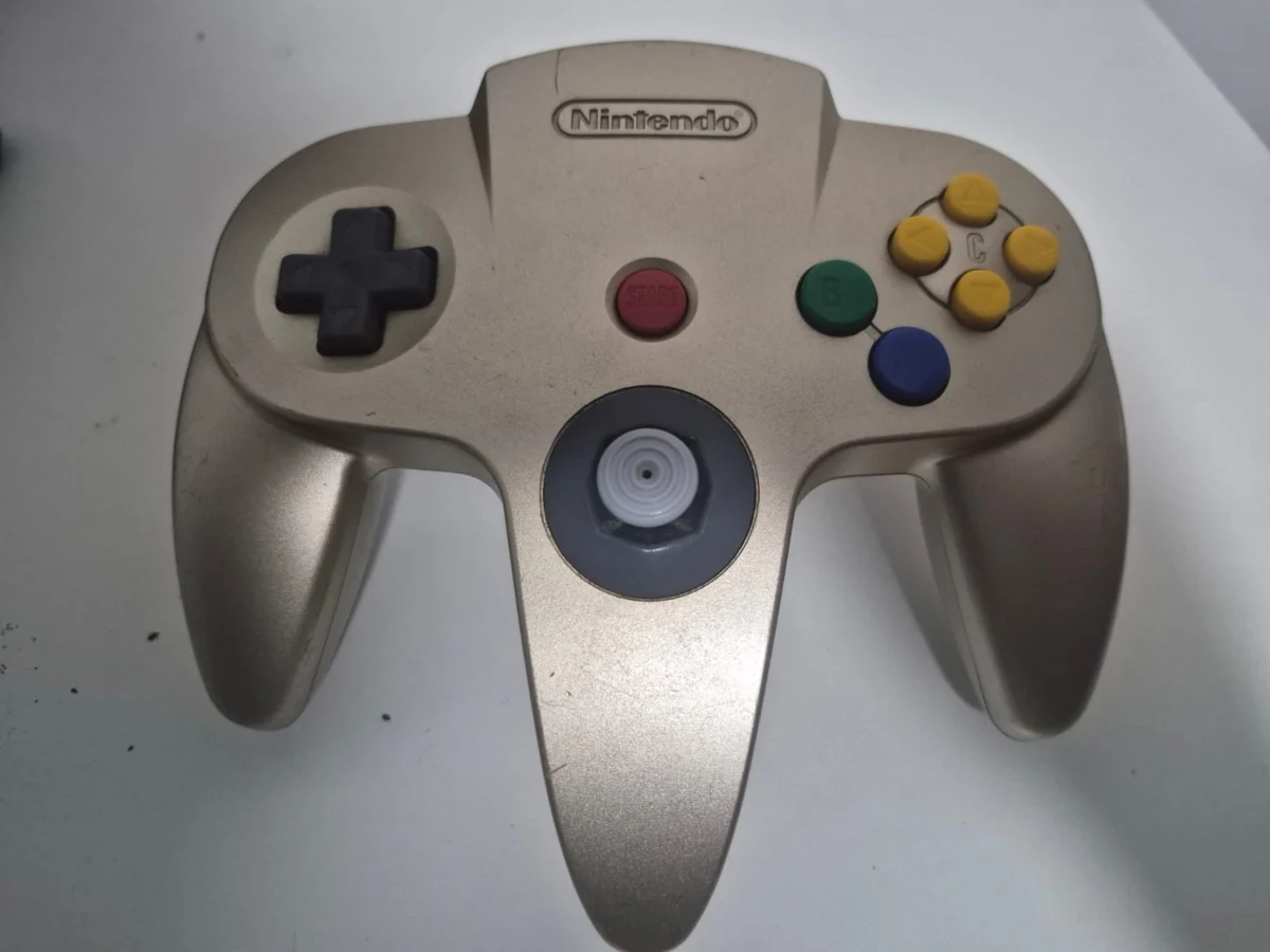 JD/ ORIGINAL CONTROLE N64 GOLD, 209,00 SEGUIDOS DE 11,00