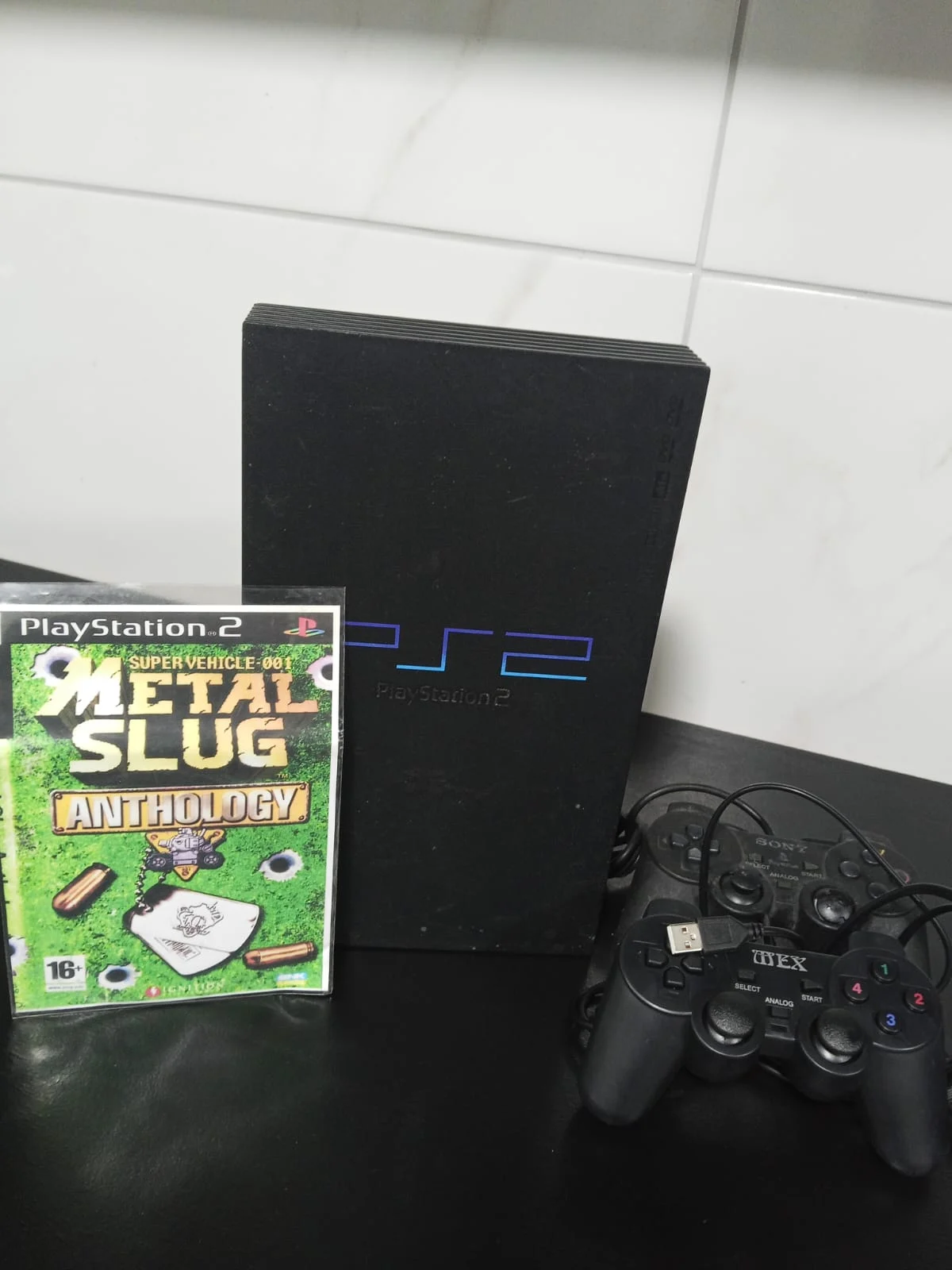 CX/ PLAYSTATION 2 FAT! 111,00 SEGUIDOS DE 15,00