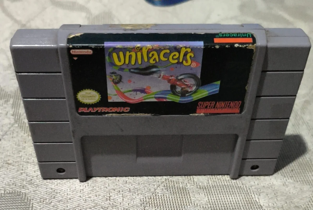 CX/ C*******iz /ORIGINAL UNIRACERS! PLAYTRONIC! SNES!  73,00 SEGUIDOS DE 9,00