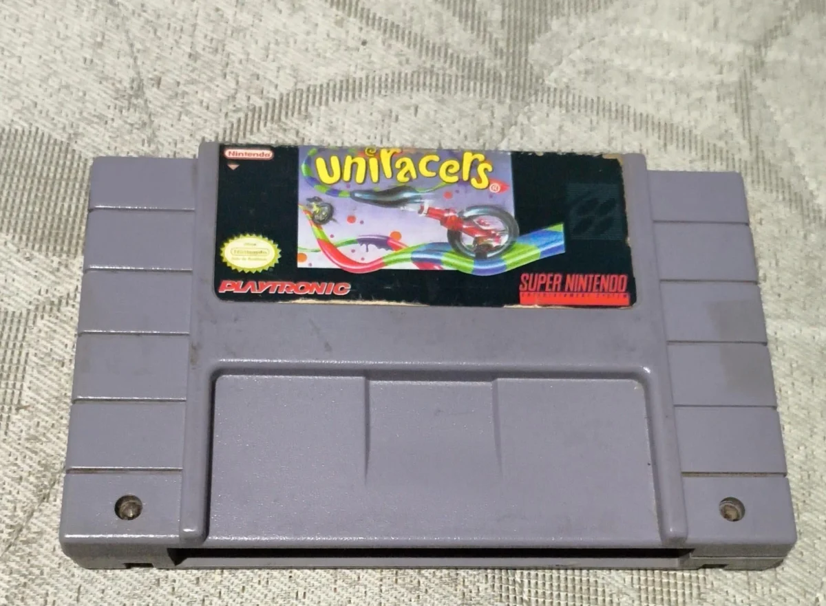CX/ C*******iz /ORIGINAL UNIRACERS! PLAYTRONIC! SNES!  73,00 SEGUIDOS DE 9,00