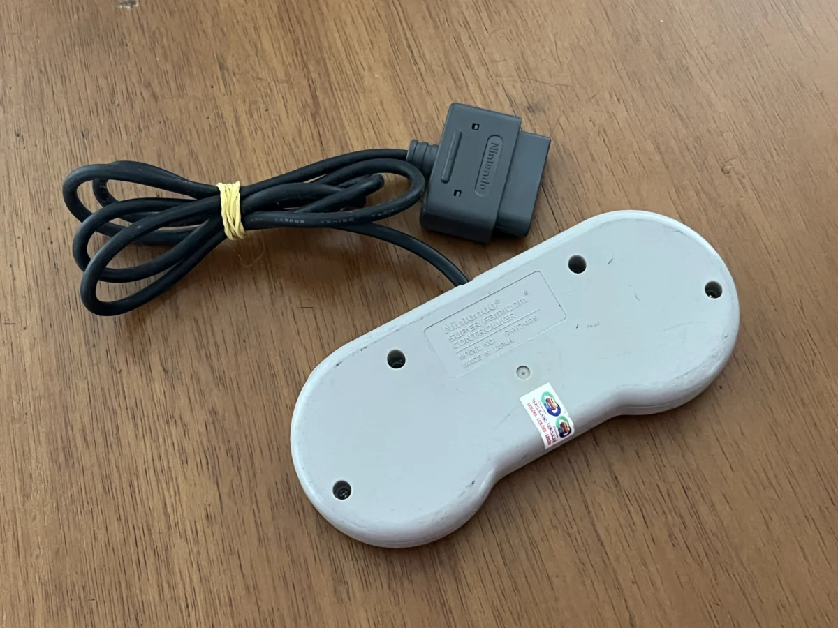 CX/ R****to B****ra C****ho /ORIGINAL! CONTROLE SNES! 47,00 SEGUIDOS DE 14,00
