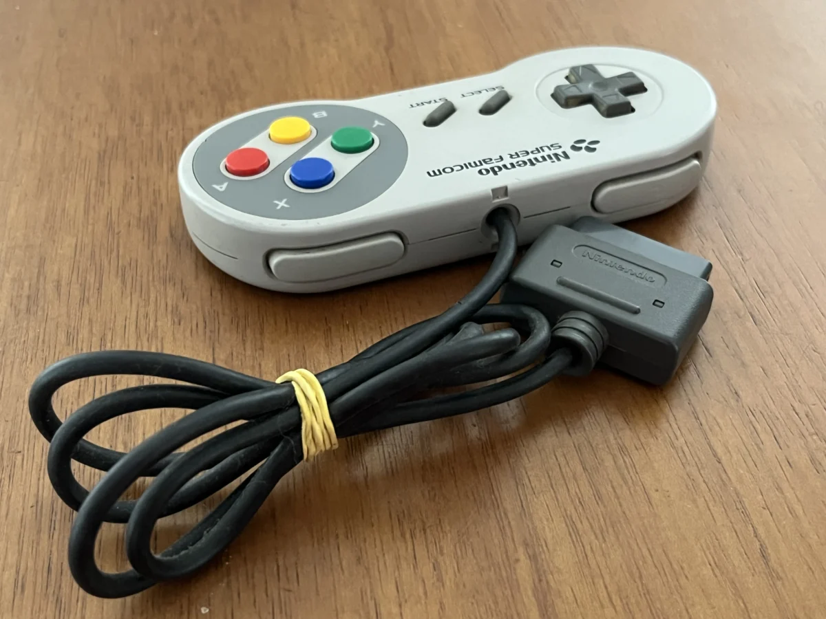 CX/ R****to B****ra C****ho /ORIGINAL! CONTROLE SNES! 47,00 SEGUIDOS DE 14,00