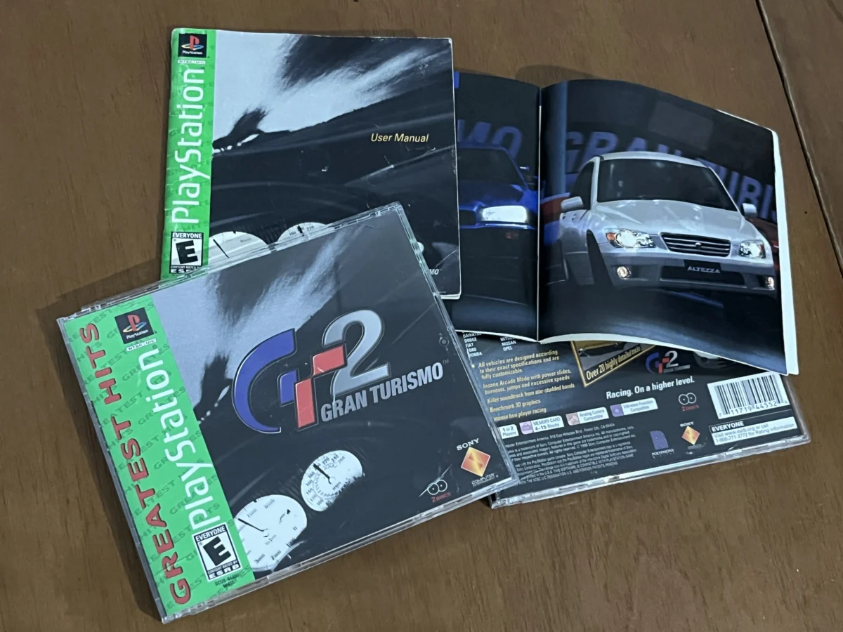CX/ L******DO /ORIGINAL GRANTURISMO 2! USA! PS1   77,00 SEGUIDOS DE 21,00