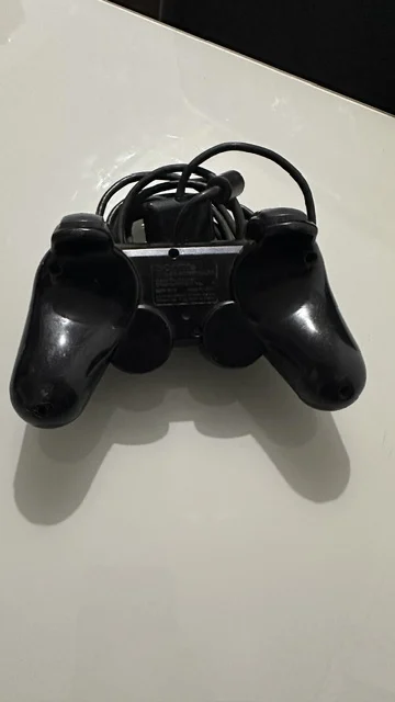 NR/ ORIGINAL CONTROLE PS2 48,00 SEGUIDOS DE 10,00