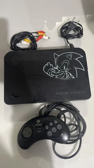 NR/ CONSOLE TECTOY MASTER  SYSTEM  87,00 SEGUIDOS DE 25,00