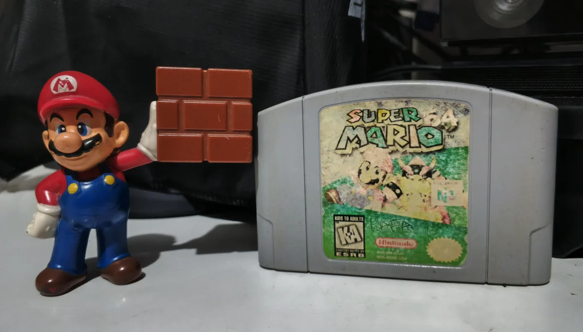 E7/ ORIGINAL SUPER MARIO 64 AMERICANO 89,00 SEGUIDOS DE 20,00
