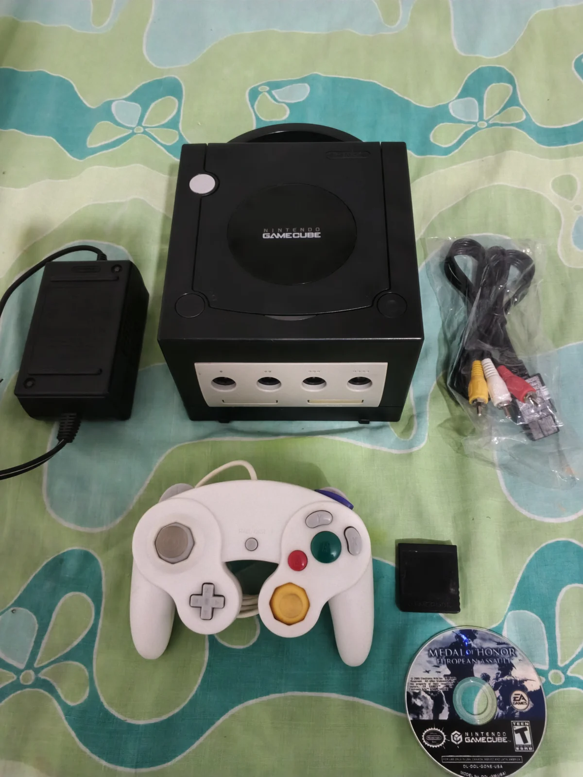 E7/ NINTENDO GAME CUBE BLACK AMERICANO 597,00 SEGUIDOS DE 25,00