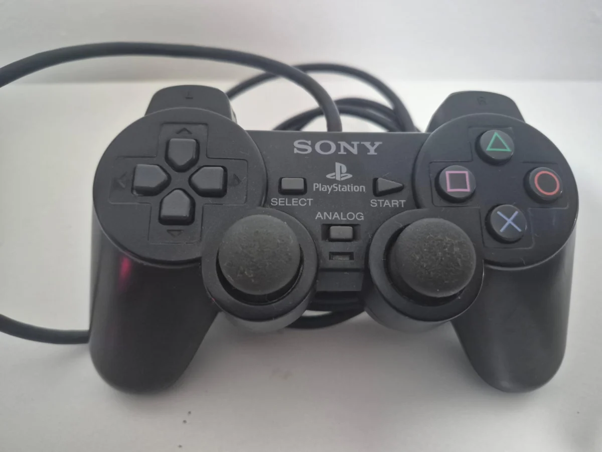 JD/ G*****TI /ORIGINAL CONTROLE PS2, 59,00 SEGUIDOS DE 6,00