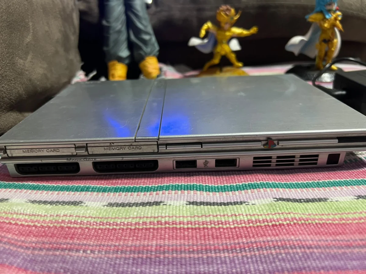 CB/ PS2 SLIM SILVER 123,00 SEGUIDOS DE 8,00
