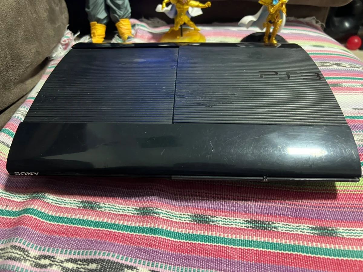 CB/ PS3 SUPER SLIM 99,00 SEGUIDOS DE 6,00