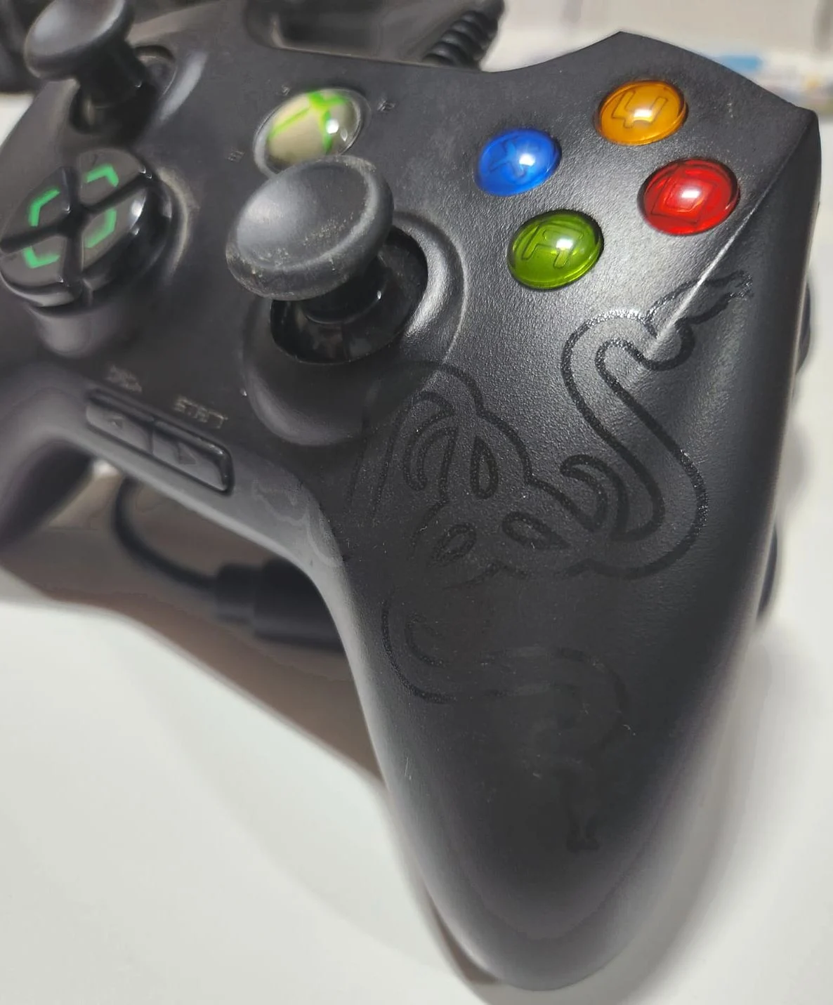 DN/ CONTROLE RAZER ONZA 89,00 SEGUIDOS DE 7,00