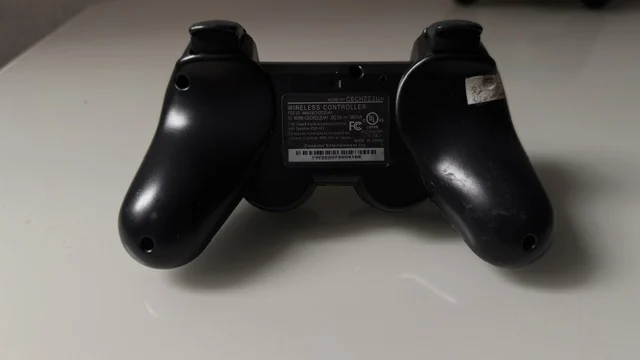 NR/ PAR DE CONTROLES PS3 26,00 SEGUIDOS DE 6,00