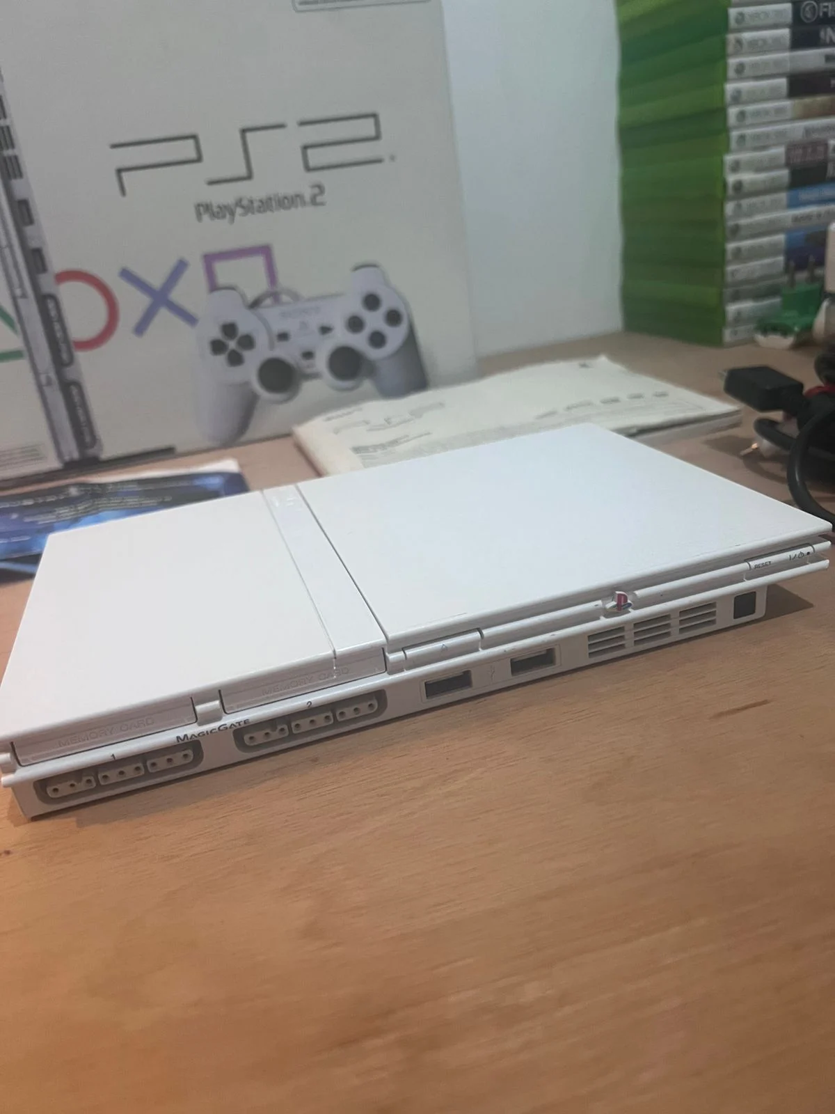 CX/ PLAYSTATION 2 SLIM CERAMIC WHITE! SONY! AMERICANO!  NA CAIXA! 497,00 SEGUIDOS DE 43,00
