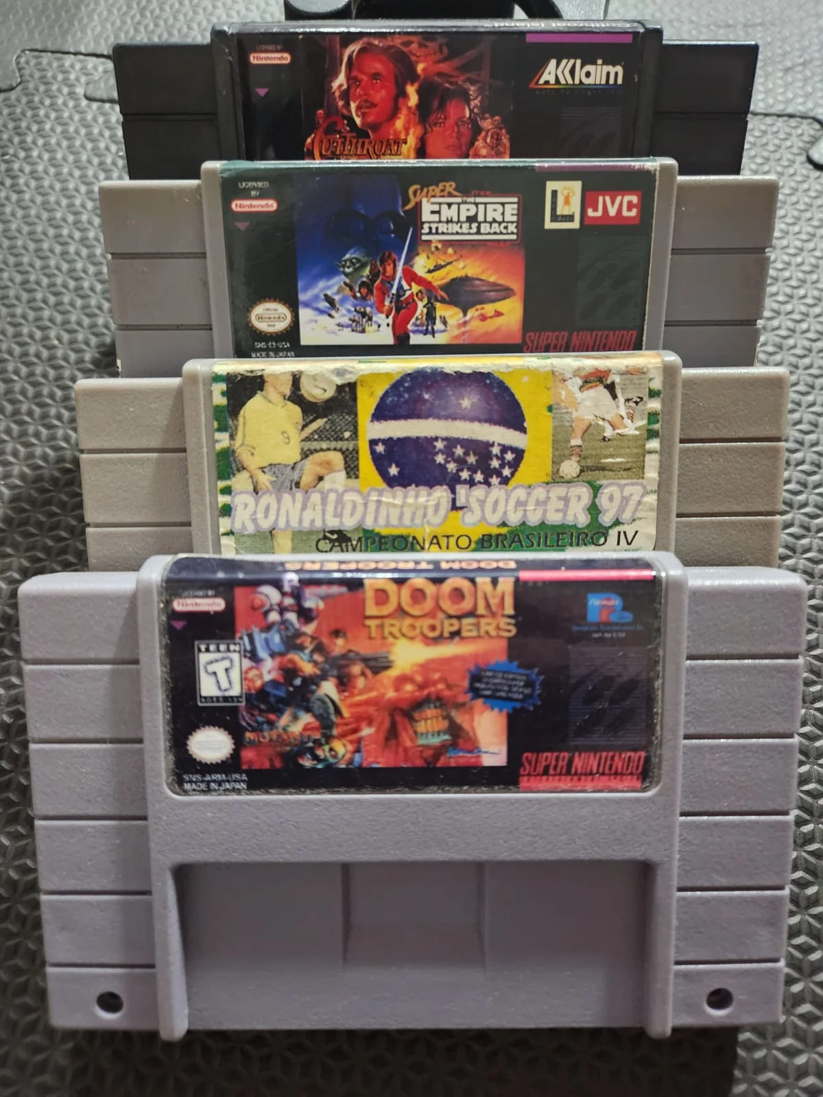 DN/ D***el /LOTE COM 4 JOGOS DE SNES 53,00 SEGUIDOS DE 7,00