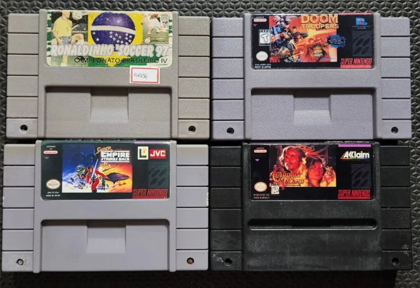 DN/ D***el /LOTE COM 4 JOGOS DE SNES 53,00 SEGUIDOS DE 7,00