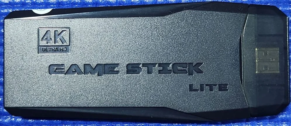 DN/ S*R /GAME STICK LITE 4K COM 2 CONTROLES 52,00 SEGUIDOS DE 8,00